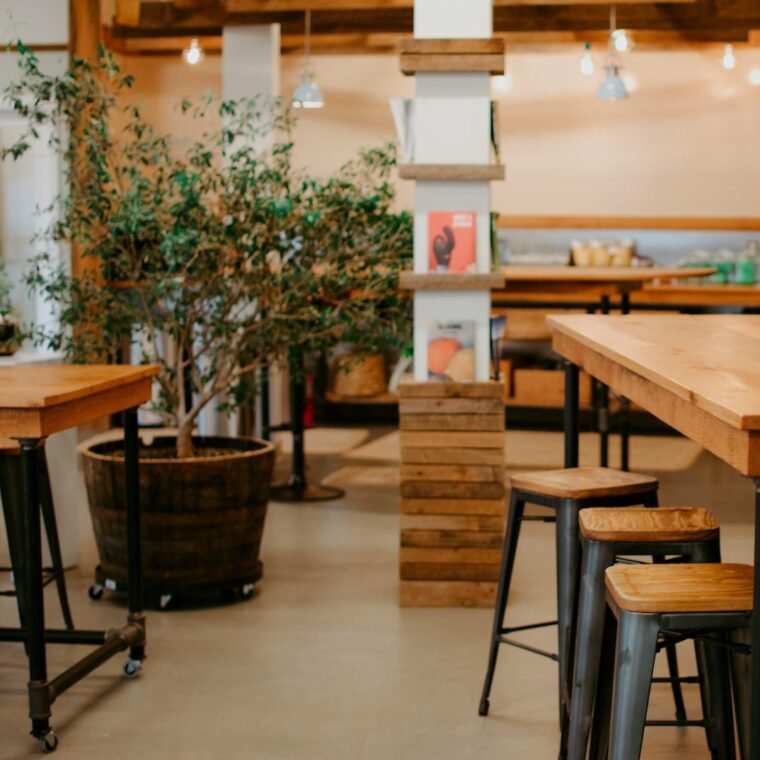 Warm and inviting café interior showcasing rustic wooden furniture and décor.